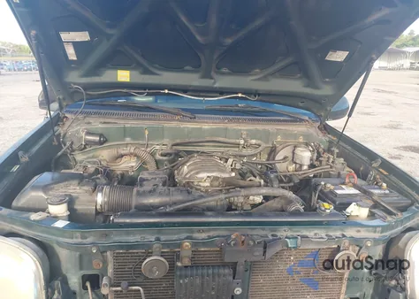 2000 Toyota Tundra Ltd V8 из США, поврежденный, VIN 5TBRT3819YS110222